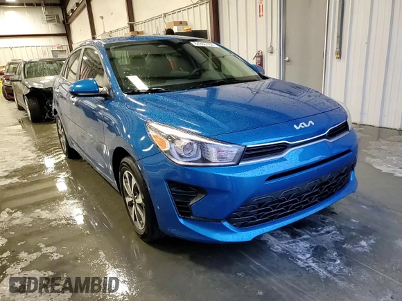 2022 Kia Rio LX with VIN 3KPA24AD3NE497373, listed as a Copart auction lot 84286184 with 27,628 mi miles and Salvage Title. Bid and sale history available at carsss.com. Image 11.