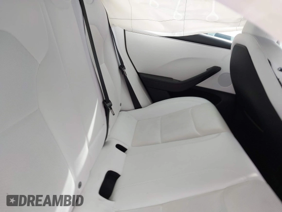 2024 Tesla Model 3 Long Range with VIN 5YJ3E1EB7RF854092, listed as a IAAI auction lot 41697646 with 7,371 mi miles and . Bid and sale history available at DreamBid. Image 8.