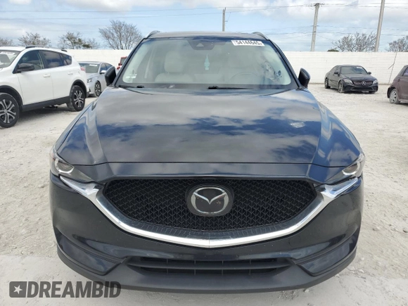 2021 Mazda CX-5 Touring z VIN JM3KFBCM8M1436782, wystawiony jako Copart lot #54144645 z przebiegiem 52 388 mil mil oraz Szkoda całkowita • Salvage title. Historia ofert i sprzedaży dostępna na DreamBid. Obrazek 5.