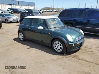 2006 MINI Hardtop with VIN WMWRC33546TK15957, listed as a Copart auction lot 54660995 with 100,893 mi miles and Clean Title. Bid and sale history available at DreamBid. Image 4.