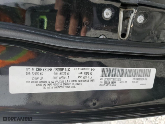 2014 Dodge Charger RT 100th Anniversary with VIN 2C3CDXCT9EH319212, listed as a Copart auction lot 52766415 with 148,105 mi miles and Salvage Title. Bid and sale history available at carsss.com. Image 12.