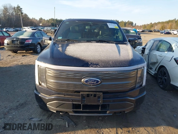 2023 Ford F-150 Lightning Pro with VIN 1FT6W1EV7PWG33511, listed as a IAAI auction lot 41761149 with 10,501 mi miles and . Bid and sale history available at DreamBid. Image 12.