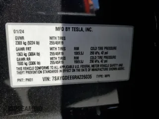 2024 Tesla Model Y Long Range with VIN 7SAYGDEE6RA226035, listed as a Copart auction lot 52539375 with 14,220 mi miles and Salvage title. Bid and sale history available at DreamBid. Image 13.