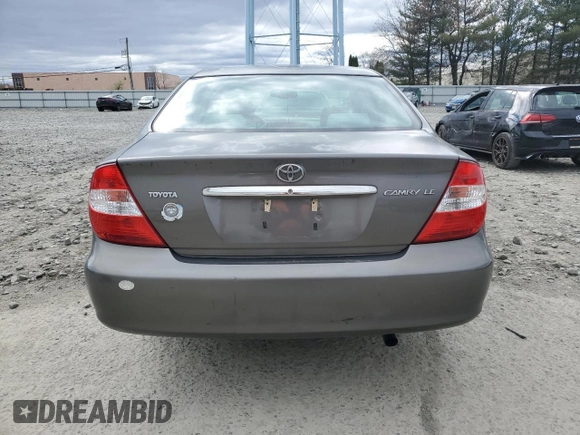 2004 Toyota Camry LE with VIN 4T1BE32K24U900340, listed as a Copart auction lot 52861095 with 92,694 mi miles and Salvage Title. Bid and sale history available at carsss.com. Image 6.
