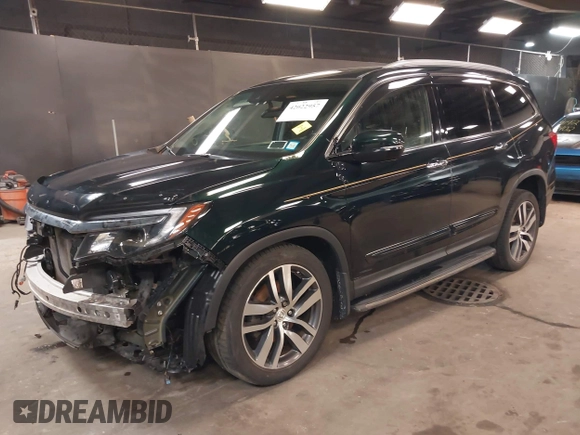 2016 Honda Pilot Touring with VIN 5FNYF6H98GB035226, listed as a IAAI auction lot 42022957 with 103,842 mi miles and . Bid and sale history available at DreamBid. Image 2.