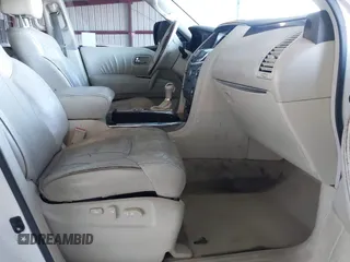 2012 Infiniti QX56 8-passenger with VIN JN8AZ2ND0C9715396, listed as a IAAI auction lot 41267602 with 206,630 mi miles and . Bid and sale history available at DreamBid. Image 5.
