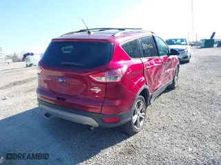 2014 Ford Escape SE with VIN 1FMCU0GX1EUC94976, listed as a IAAI auction lot 41890726 with 119,097 mi miles. Bid and sale history available at carsss.com. Image 4.