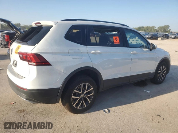 2021 Volkswagen Tiguan S z VIN 3VV1B7AX1MM155177, wystawiony jako Copart lot #70585534 z przebiegiem Nie podano mil oraz Szkoda całkowita • Salvage title. Historia ofert i sprzedaży dostępna na DreamBid. Obrazek 3.