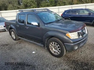 2011 Nissan Frontier SL with VIN 1N6AD0ER2BC432071, listed as a Copart auction lot 81406294 with 114,945 mi miles and Salvage title. Bid and sale history available at DreamBid. Image 4.