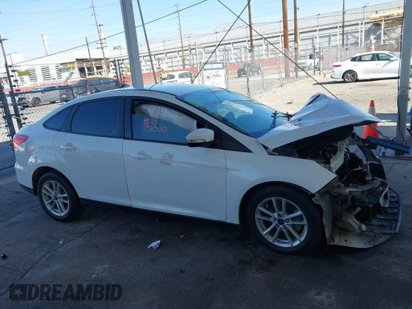 2017 Ford Focus SE with VIN 1FADP3F2XHL300331, listed as a IAAI auction lot 41975453 with Not provided miles and . Bid and sale history available at DreamBid. Image 12.