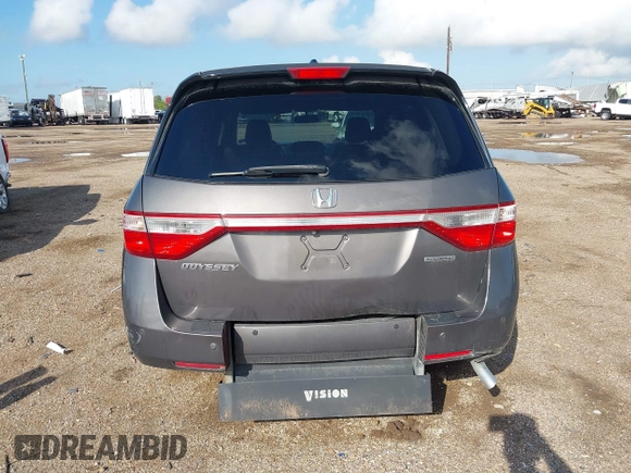 2011 Honda Odyssey Touring with VIN 5FNRL5H93BB104436, listed as a IAAI auction lot 40426003 with 93,342 mi miles and . Bid and sale history available at DreamBid. Image 16.