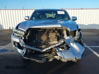 2023 Toyota Tacoma SR5 z VIN 3TMDZ5BN6PM156824, wystawiony jako IAAI lot #41031932 z przebiegiem 14 226 mil mil oraz . Historia ofert i sprzedaży dostępna na DreamBid. Obrazek 12.