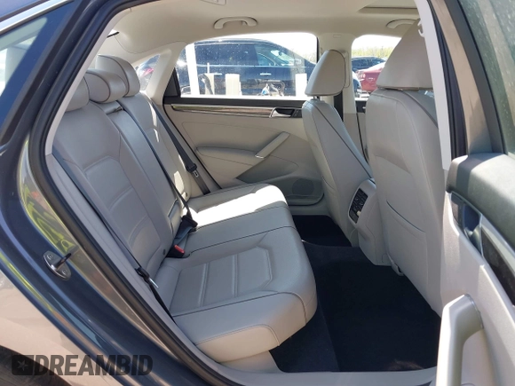 2017 Volkswagen Passat SE with VIN 1VWBT7A3XHC015940, listed as a IAAI auction lot 42027997 with 28,442 mi miles and . Bid and sale history available at DreamBid. Image 8.