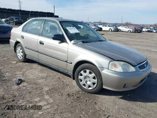2000 Honda Civic LX with VIN 1HGEJ6679YL066102, listed as a IAAI auction lot 41585270 with 164,714 mi miles. Bid and sale history available at carsss.com. Image 1.