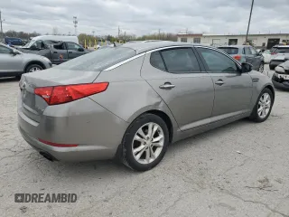 2013 Kia Optima EX z VIN 5XXGN4A7XDG224691, wystawiony jako Copart lot #52872175 z przebiegiem 218 951 mil mil oraz Szkoda całkowita • Salvage title. Historia ofert i sprzedaży dostępna na DreamBid. Obrazek 3.