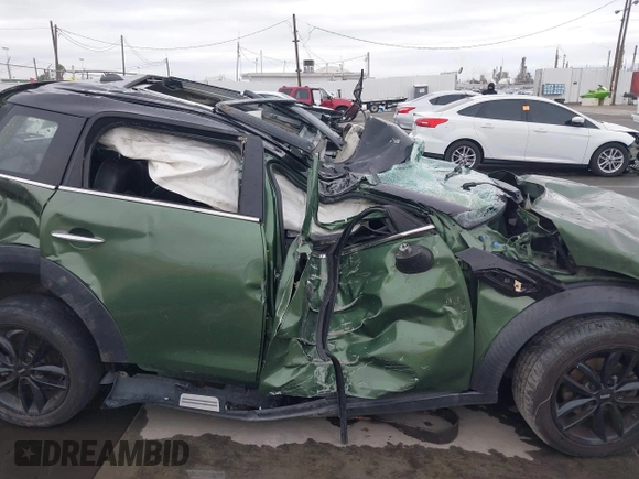 2015 MINI Countryman z VIN WMWZB3C59FWR43209, wystawiony jako IAAI lot #41761218 z przebiegiem Nie podano mil oraz . Historia ofert i sprzedaży dostępna na DreamBid. Obrazek 13.