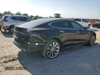 2015 Tesla Model S 85D with VIN 5YJSA1E48FF118749, listed as a Copart auction lot 54516035 with 115,380 mi miles and Salvage Title. Bid and sale history available at carsss.com. Image 3.