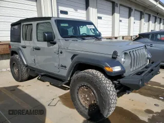 2023 Jeep Wrangler Sport S with VIN 1C4HJXDG8PW675134, listed as a Copart auction lot 85949314 with 19,128 mi miles and Salvage Title. Bid and sale history available at DreamBid. Image 4.