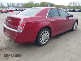 2012 Chrysler 300 C with VIN 2C3CCAKTXCH220185, listed as a IAAI auction lot 42110327 with 57,682 mi miles and . Bid and sale history available at DreamBid. Image 4.