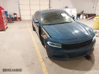 2021 Dodge Charger SXT with VIN 2C3CDXBG8MH522255, listed as a IAAI auction lot 41587621 with 136,063 mi miles. Bid and sale history available at carsss.com. Image 1.