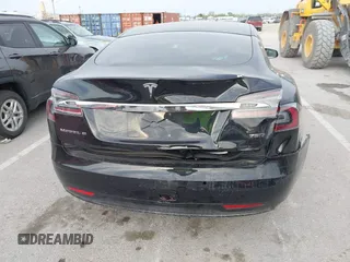 2017 Tesla Model S 100D with VIN 5YJSA1E28HF188981, listed as a IAAI auction lot 42010115 with 76,327 mi miles and . Bid and sale history available at DreamBid. Image 6.
