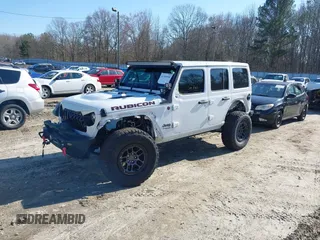 2022 Jeep Wrangler Unlimited Rubicon z VIN 1C4JJXFGXNW121489, wystawiony jako IAAI lot #41749550 z przebiegiem 56 601 mil mil oraz . Historia ofert i sprzedaży dostępna na DreamBid. Obrazek 18.