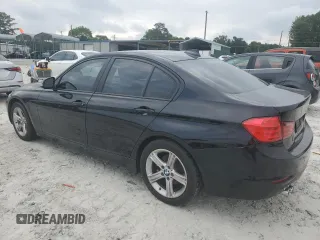 2013 BMW 3 Series 328i with VIN WBA3A5C50DF354910, listed as a Copart auction lot 59496445 with 133,089 mi miles and Salvage title. Bid and sale history available at DreamBid. Image 2.