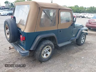 1997 Jeep Wrangler SE with VIN 1J4FY29P2VP446769, listed as a IAAI auction lot 42782194 with 98,352 mi miles and . Bid and sale history available at DreamBid. Image 4.