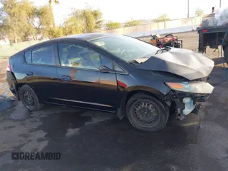 2010 Honda Insight LX with VIN JHMZE2H59AS006887, listed as a IAAI auction lot 41159288 with 263,497 mi miles and . Bid and sale history available at DreamBid. Image 13.