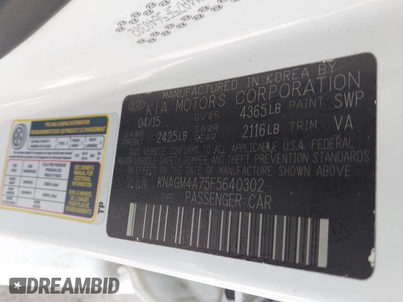 2015 Kia Optima LX with VIN KNAGM4A75F5640302, listed as a IAAI auction lot 42179864 with 95,891 mi miles and . Bid and sale history available at DreamBid. Image 9.