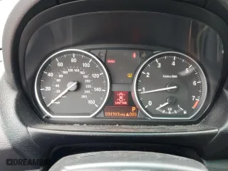 2011 BMW 1 Series 128i with VIN WBAUN1C5XBVH82605, listed as a Copart auction lot 73457334 with 94,969 mi miles and Salvage Title. Bid and sale history available at carsss.com. Image 9.