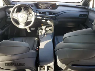 2021 Lexus UX with VIN JTHE9JBH4M2039025, listed as a Copart auction lot 41809335 with 58,569 mi miles and Salvage Title. Bid and sale history available at carsss.com. Image 8.