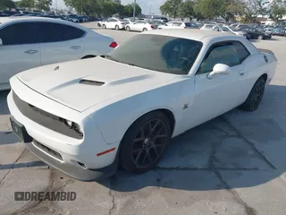 2016 Dodge Challenger R/T Scat Pack z VIN 2C3CDZFJ5GH289781, wystawiony jako IAAI lot #42098014 z przebiegiem Nie podano mil oraz . Historia ofert i sprzedaży dostępna na DreamBid. Obrazek 2.