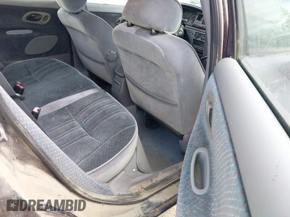 1995 Ford Contour z VIN 3FALP6633SM116313, wystawiony jako IAAI lot #42058920 z przebiegiem 192 905 mil mil oraz . Historia ofert i sprzedaży dostępna na DreamBid. Obrazek 8.