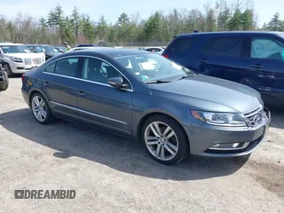 2014 Volkswagen CC Lux with VIN WVWRP7AN7EE501483, listed as a IAAI auction lot 42090985 with 121,737 mi miles. Bid and sale history available at carsss.com. Image 1.