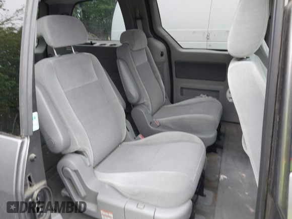 2006 Ford Freestar SEL z VIN 2FMZA52256BA51562, wystawiony jako IAAI lot #42197610 z przebiegiem 120 768 mil mil oraz . Historia ofert i sprzedaży dostępna na DreamBid. Obrazek 8.
