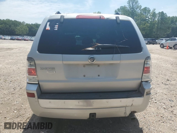 2009 Mercury Mariner Premier z VIN 4M2CU87G19KJ14006, wystawiony jako Copart lot #63615445 z przebiegiem 216 941 mil mil oraz Szkoda całkowita • Salvage title. Historia ofert i sprzedaży dostępna na DreamBid. Obrazek 6.