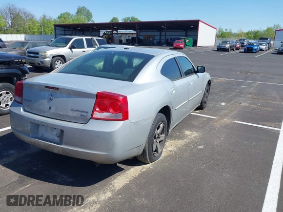 2010 Dodge Charger SXT with VIN 2B3CA3CV4AH253226, listed as a IAAI auction lot 42031664 with 173,785 mi miles. Bid and sale history available at carsss.com. Image 4.