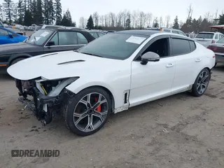 2021 Kia Stinger GT2 with VIN KNAE55LC5M6097982, listed as a IAAI auction lot 41568157 with 57,836 mi miles. Bid and sale history available at carsss.com. Image 2.