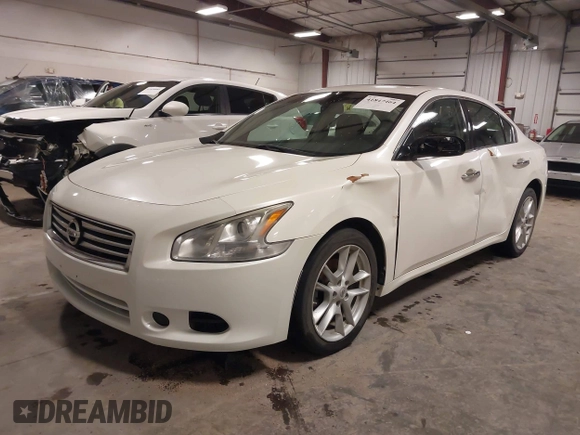 2014 Nissan Maxima S with VIN 1N4AA5AP1EC439827, listed as a IAAI auction lot 41847464 with 135,205 mi miles and . Bid and sale history available at DreamBid. Image 19.