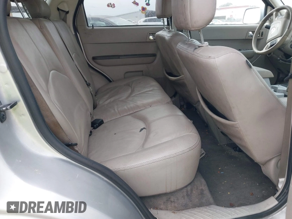 2008 Mercury Mariner with VIN 4M2CU39H58KJ39854, listed as a IAAI auction lot 41567810 with 267,329 mi miles and . Bid and sale history available at DreamBid. Image 8.