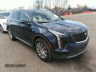 2021 Cadillac XT4 FWD Premium Luxury with VIN 1GYFZCR48MF004009, listed as a IAAI auction lot 41956723 with 82,483 mi miles. Bid and sale history available at carsss.com. Image 1.
