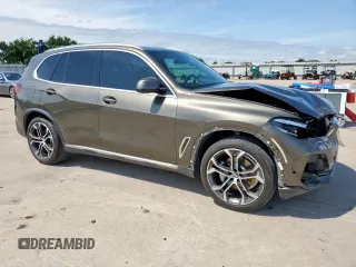2023 BMW X5 xDrive40i with VIN 5UXCR6C01P9P27041, listed as a Copart auction lot 59009585 with 45,568 mi miles and Salvage title. Bid and sale history available at DreamBid. Image 4.