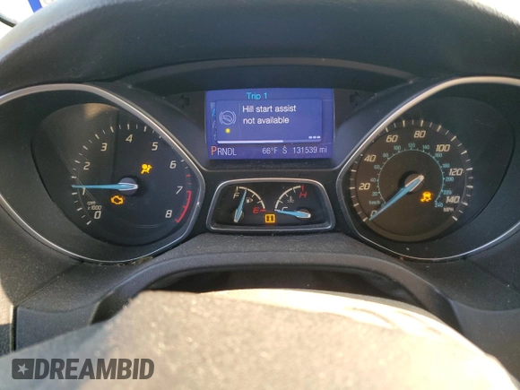 2013 Ford Focus SE z VIN 1FADP3F22DL233878, wystawiony jako Copart lot #52598475 z przebiegiem 131 539 mil mil oraz Szkoda całkowita • Salvage title. Historia ofert i sprzedaży dostępna na DreamBid. Obrazek 9.