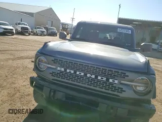 2023 Ford Bronco with VIN 1FMEE5DP0PLC10002, listed as a Copart auction lot 57272555 with 14,035 mi miles and Salvage title. Bid and sale history available at DreamBid. Image 14.