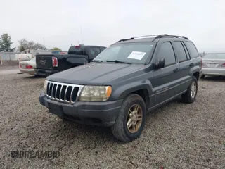 2003 Jeep Grand Cherokee Laredo with VIN 1J4GX48SX3C604904, listed as a IAAI auction lot 40884443 with 188,352 mi miles. Bid and sale history available at carsss.com. Image 18.