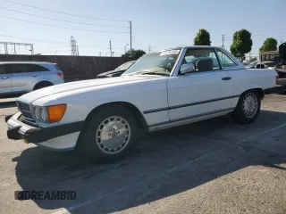 1986 Mercedes-Benz 560 SL z VIN WDBBA48D8GA045467, wystawiony jako Copart lot #57576155 z przebiegiem 64 819 mil mil oraz Tytuł czysty. Historia ofert i sprzedaży dostępna na DreamBid. Obrazek 1.