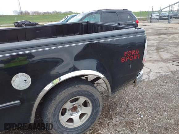 1997 Ford F-150 with VIN 2FTDX1720VCA73590, listed as a IAAI auction lot 41956713 with 128,220 mi miles and . Bid and sale history available at DreamBid. Image 6.