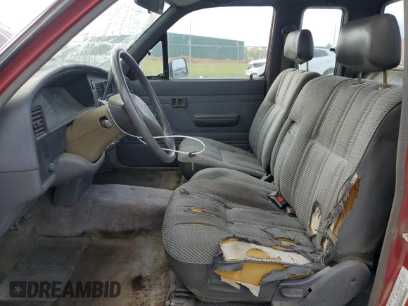 1992 Toyota Pickup DLX z VIN JT4RN93P1N5052818, wystawiony jako Copart lot #77344244 z przebiegiem 484 357 mil mil oraz Szkoda całkowita • Salvage title. Historia ofert i sprzedaży dostępna na DreamBid. Obrazek 7.