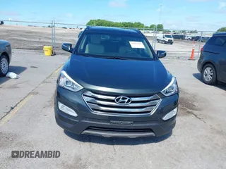 2014 Hyundai Santa Fe with VIN 5XYZUDLB0EG187984, listed as a IAAI auction lot 42607599 with 111,594 mi miles and . Bid and sale history available at DreamBid. Image 12.